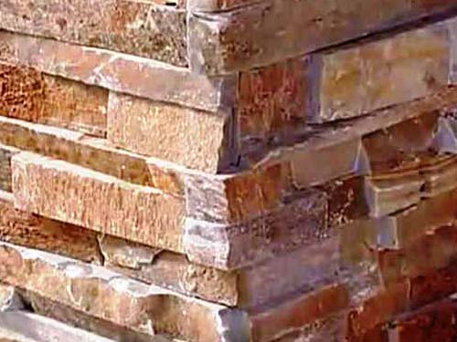Методы отделки фасада дома искусственным камнем